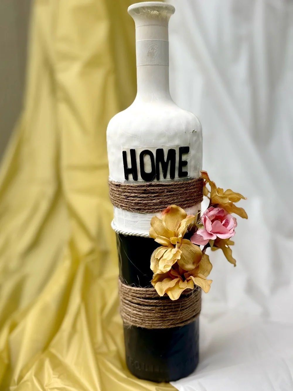 Decorative 'HOME' Bottle Vase with Jute Wrap and Yellow-Pink Floral Accent